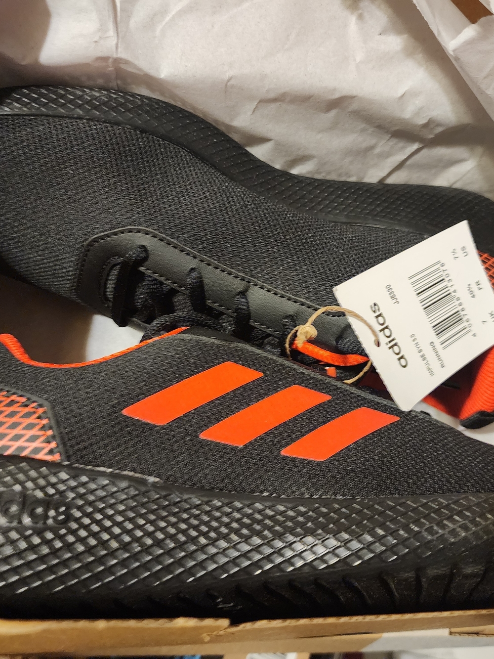 adidas Men’s Black Sneakers with Bright Orange Stripes